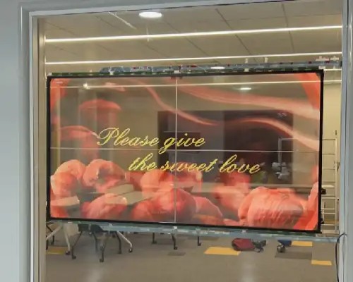How is a 55-inch Transparent OLED Screen Spliced?